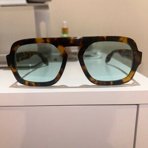 elisa johnson jane in brown tortoise with blue lenses